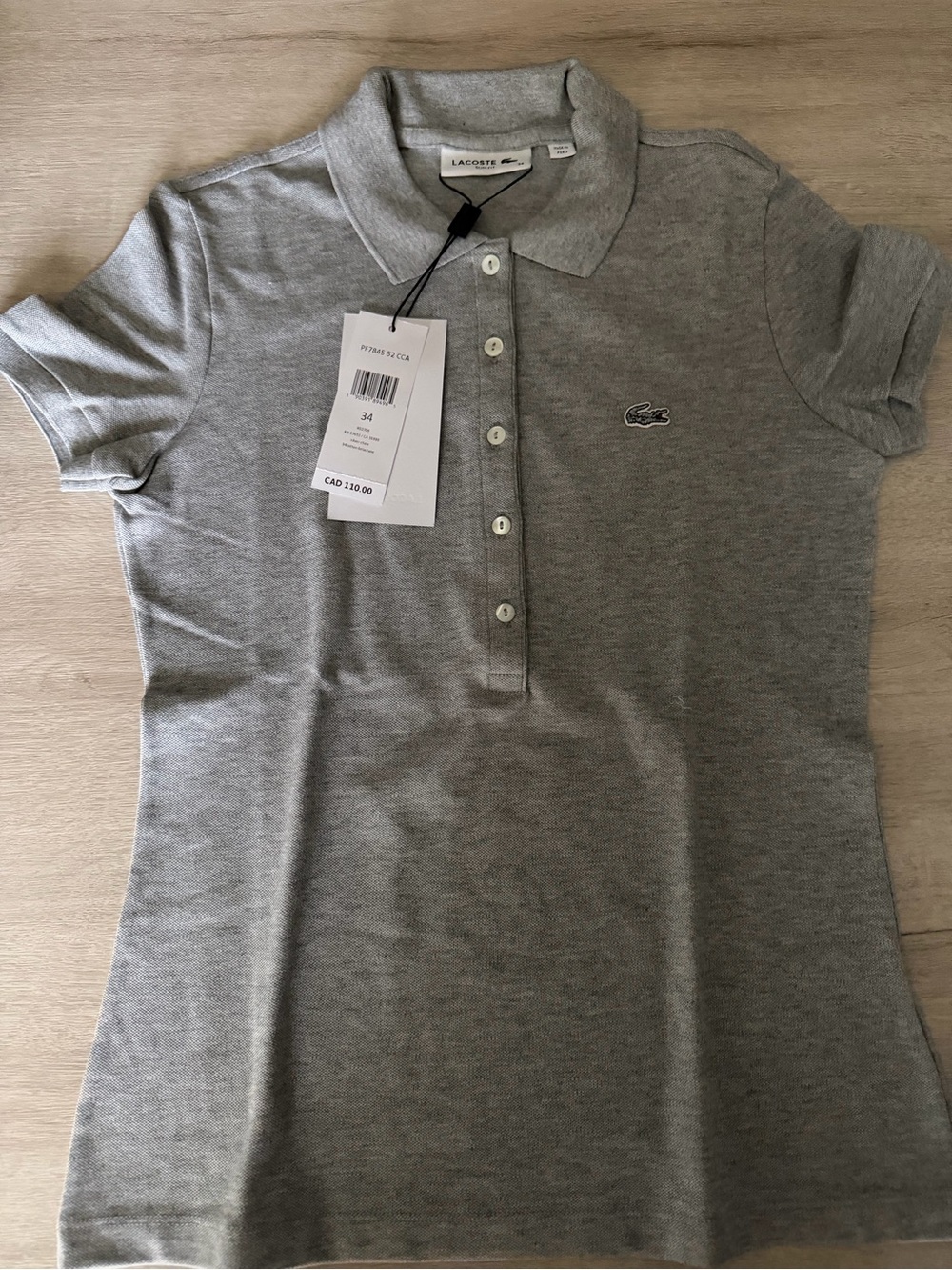 Lacoste Women's Gray Pique Polo Shirt new with tags size 34/US2